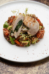 Baked chicken breast with quinoa rice. Healthy food