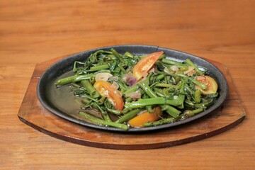 Saute kale with delicious oyster sauce