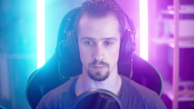 Toxic gamer point finger towards camera and beheads opponents webcam POV 4K