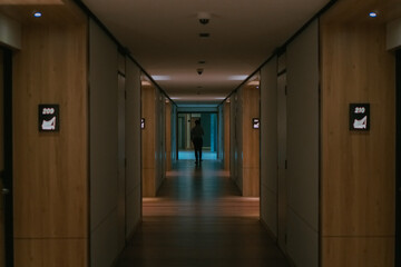 Hotel's corridor with someone in the middle