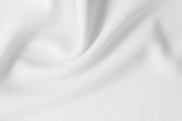 White wavy clothes background. fabric texture