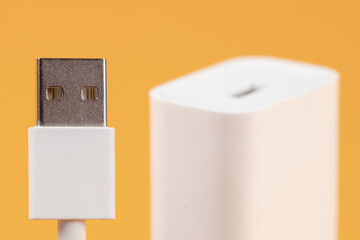 Usb cable with usb connector on yellow background