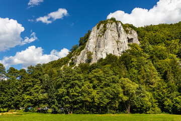 Fototapeta na wymiar Sokolica mountain limestone peak in Bedkowska Valley within Jura Krakowsko-Czestochowska upland near Cracow in Lesser Poland