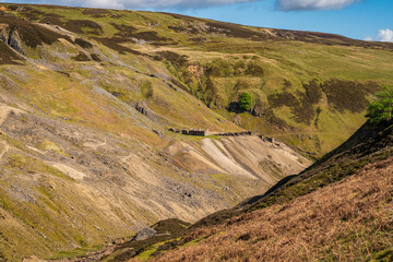 Yorkshire Dales landscape at the Gunnerside Gill, with the remains of Bunton Mine, near Gunnerside, North Yorkshire, England, UK