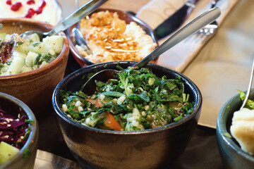 Aramic mezze platter (starters) - hummus, mutabbal, babaganosh, tabbouleh, pita