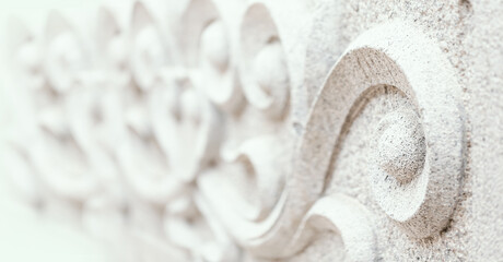 Traditional granite stone curve sculpture.Oriental style in.monochrome for background,very shallow depth of field and selective focus.