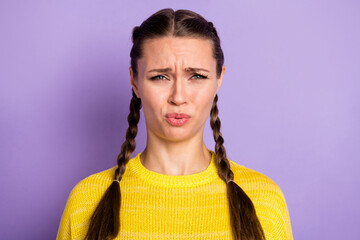 Portrait of sad brunette girl wear yellow sweater isolated on pastel lilac color background
