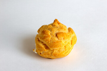 Eclairs on white background, eclairs with cream.