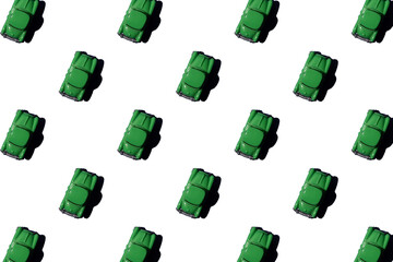 Isolated toy retro green car in seamless pattern on white background. 