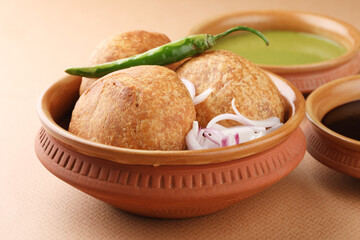 Kachori is small and round shape  stuffed with masala and cashew.Indian Traditional dry fruit Kachori Also Know As Mawa Kachori.deep-fried snack filled with dry fruits 