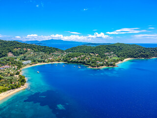 Aerial view over southern skiathos island, Greece with modern hotels and luxurious villas in Sporades, Greece,