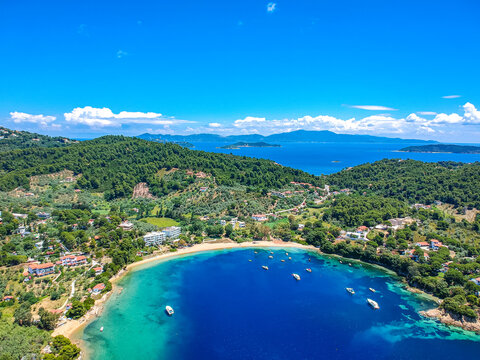 Aerial view over southern skiathos island, Greece with modern hotels and luxurious villas in Sporades, Greece,