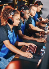 Professional cybersport team wearing headphones participating in eSport tournament, playing online...