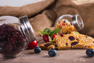 Delicious cereal bars with red berries - Top view of various healthy granola bars.
