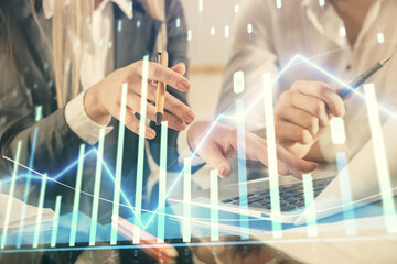 Double exposure of man and woman working together and forex chart hologram. Business concept. Computer background.