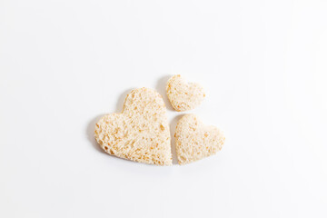 a heart shape cutted out of wholewheat bread