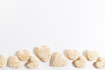 a heart shape cutted out of wholewheat bread