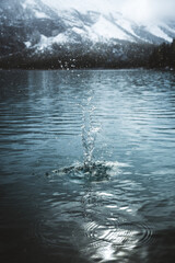 splash of water after trowing a stone into Lake Oeschinesee