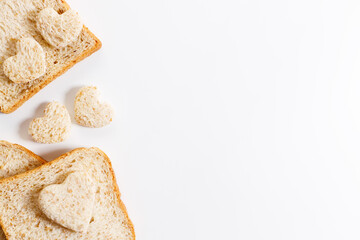 a heart shape cutted out of wholewheat bread