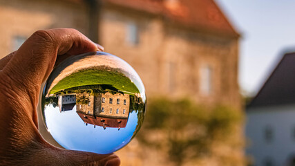 Crystal ball landscape shot at Obernberg, Upper Austria, Austria