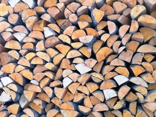 firewood, winter day in a Russian village trees in the snow frost