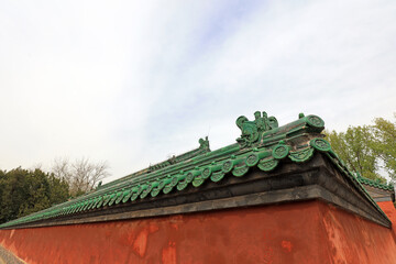 Fototapeta na wymiar Chinese classical glazed tile architecture landscape in Ditan Park, Beijing, China
