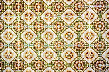 Traditional green, rust, gold and white Portuguese wall tiles