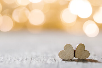 Two hearts on bokeh background