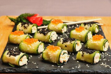 Cucumber rolls, vegetarian food, delicious and healthy breakfast