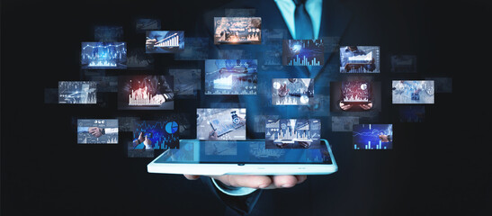 Man holding a digital pictures of business graphs. Business. Technology
