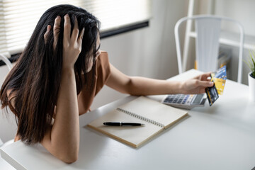 Woman is stressed and overthink by debt from many credit cards.