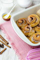Cinnabon rolls at the baking tray.
