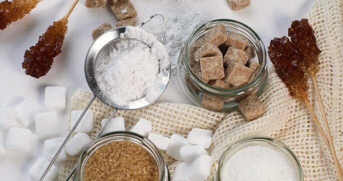 Different types of sugar. Rotate, top view