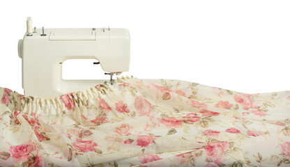 White sewing machine isolated on a white background. Lightweight tulle curtain