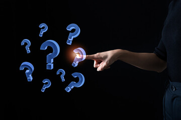 businessman pointing a question mark