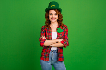 Portrait of her she nice attractive fashionable pretty cute content cheerful cheery wavy-haired girl spending event occasion folded arms isolated over bright vivid shine vibrant green color background