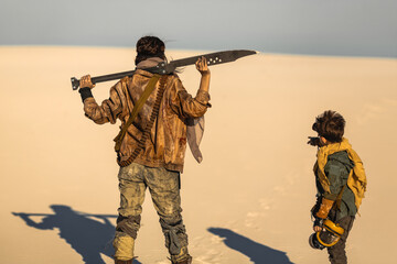 Post Apocalyptic Woman and Boy Outdoors in the Wasteland