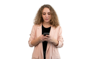 Fototapeta premium Business woman in a suit is typing with her phone, isolated on white background.