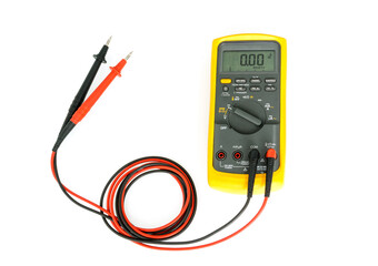 Yellow Digital multimeter with probes on white background , A multimeter is an electronic measuring instrument.