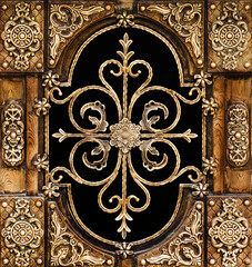 Close-up view of a part of a beautiful  metal and wood house garage door 