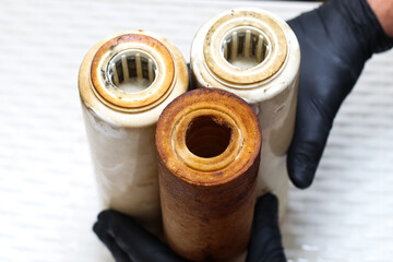 Three replaceable used water filters. Replaceable dirty filters for filtration of reverse osmosis...