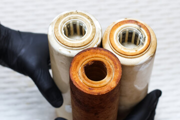 Three replaceable used water filters. Replaceable dirty filters for filtration of reverse osmosis...
