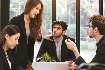 Business professional people group, team of young asian, caucasian working and communicating, analyzing data, discussing, using laptop computer explain about new project with colleagues in workplace.