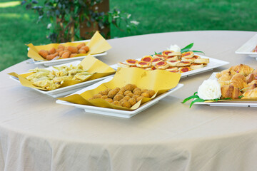 Snacks on the table outdoors. festive buffet 