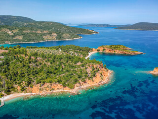 Fototapeta premium Aerial drone view over Chrisi Milia beach and the rocky surrounded area in Alonnisos island, Sporades, Greece