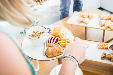 Close up of a woman having a delicious breakfast.