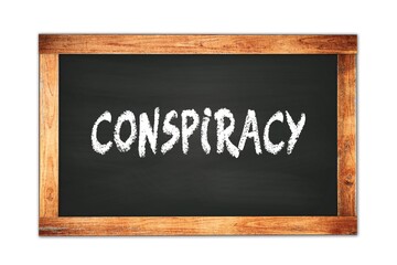 Fototapeta premium CONSPIRACY text written on wooden frame school blackboard.