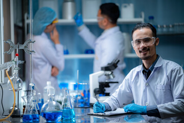 Health care researchers working in medicals science technology research in laboratory