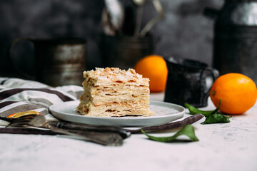 Napoleon cake in a plate on the table