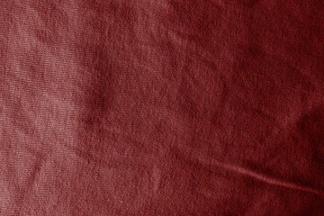 Dark red cotton texture. Red background